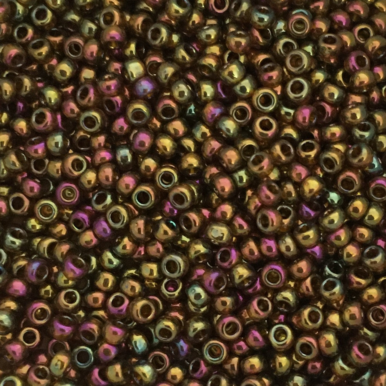 Toho Seed Beads size 11/0  Gold-lined Dark Topaz TRD-459