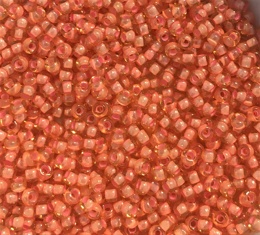 Toho Seed Beads size 11/0 Jonquil/Coral-lined TRD-956