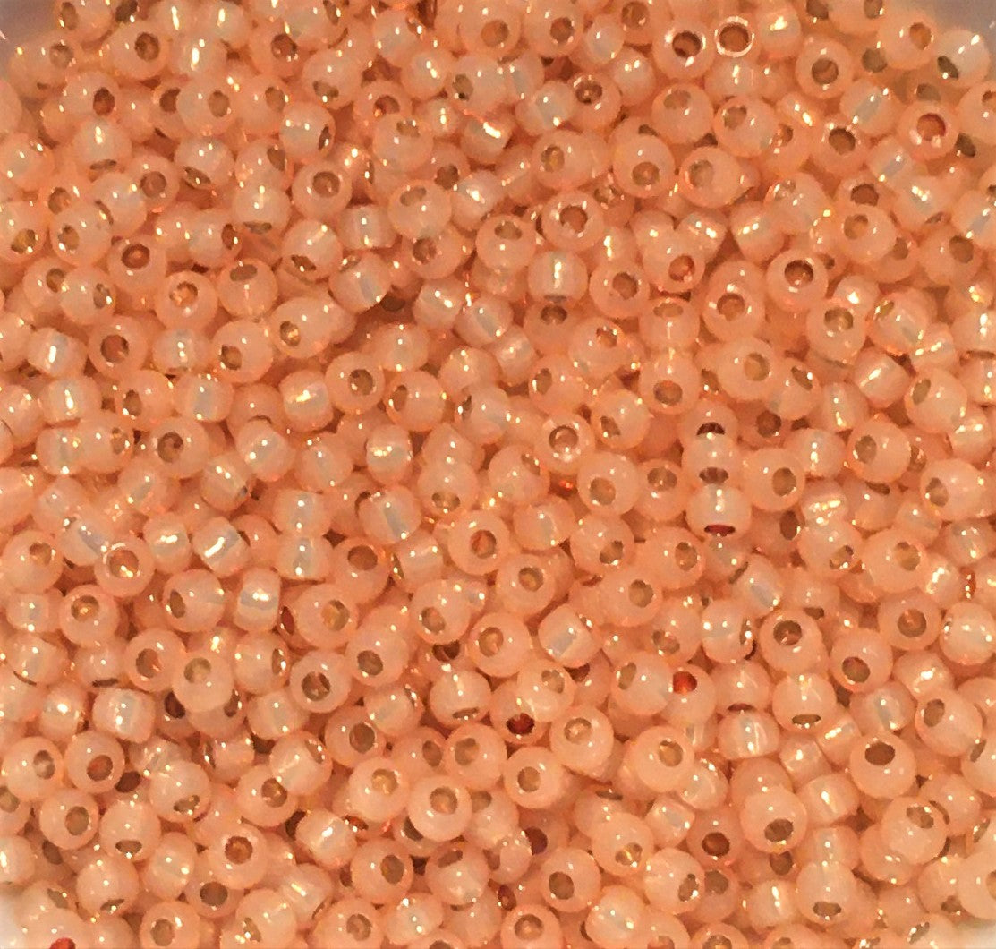 Toho Seed Beads size 11/0 Silver-lined, Milky Peach TRD-PF2111